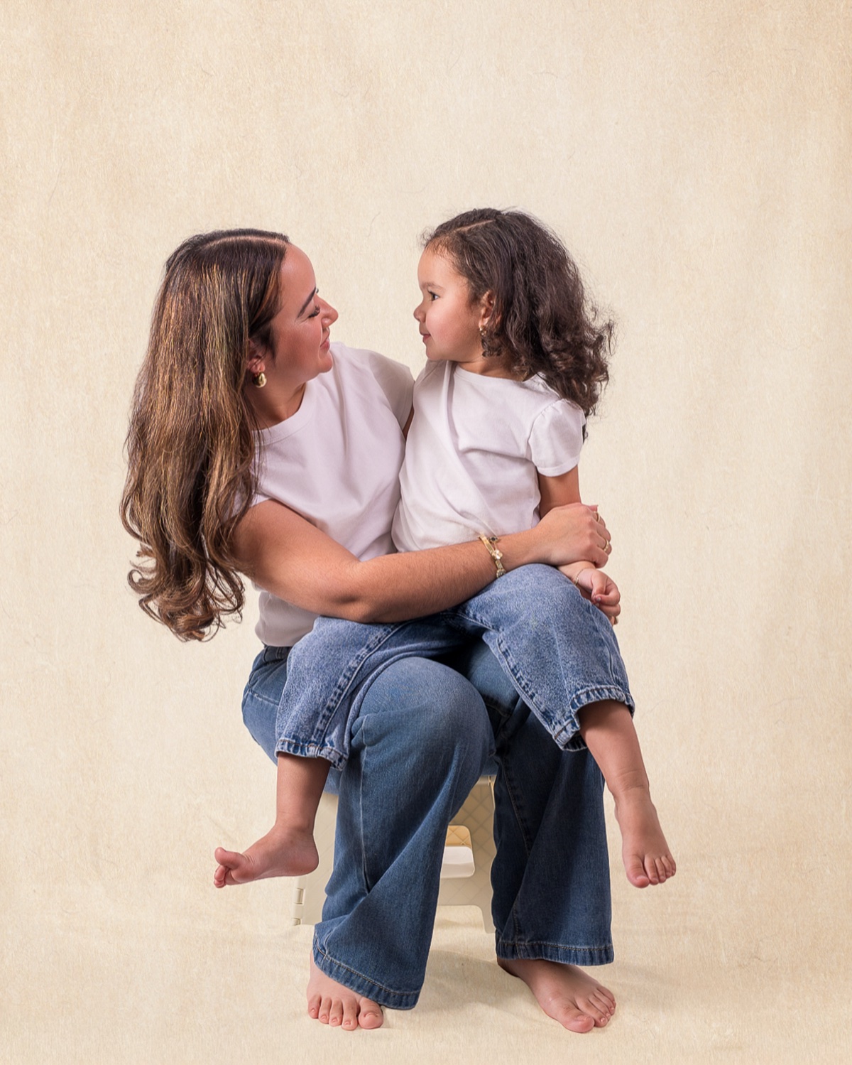 Mother and daughter studio portrait, neutral backdrop — Austin family photographer
